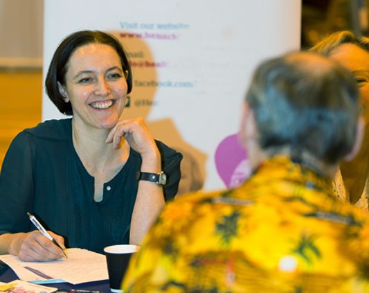Healthwatch assistant at an event