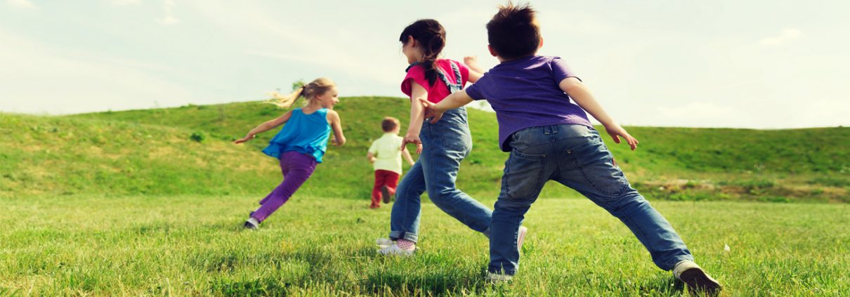 children playing on grassland