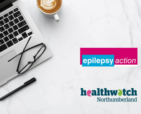 Laptop and coffee cup with Epilepsy Action logo