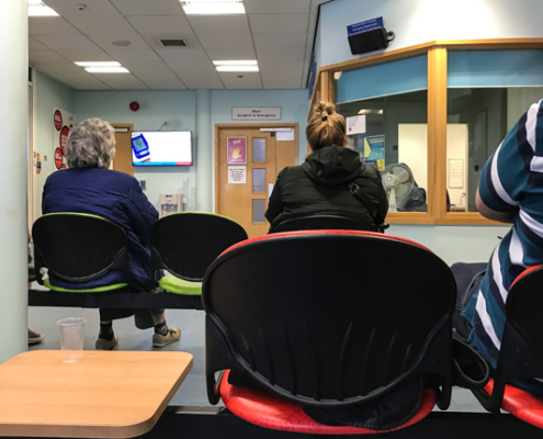 people in a hospital waiting room
